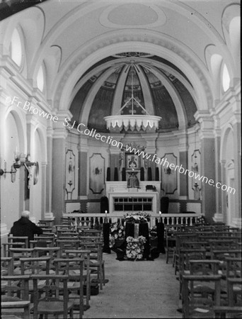 MRS K'S COFFIN IN CHURCH